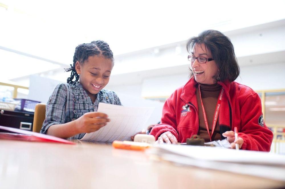 Reading Corps tutor and student